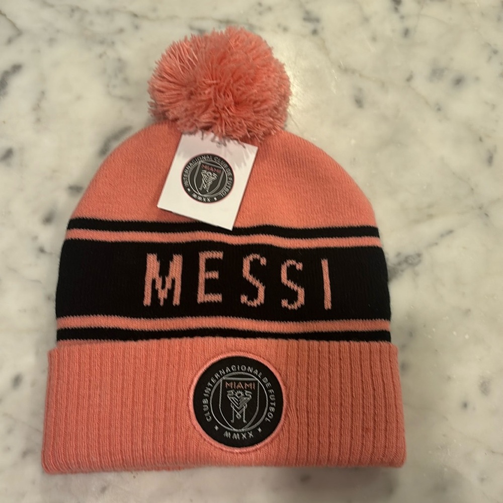 New with tags Messi beanie with puff.  Pink- one size fits all